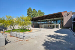 Outdoor courtyard with a circular landscaped focal point